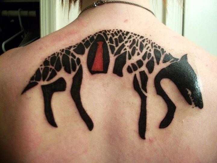 Great black ink wolf tattoo on back