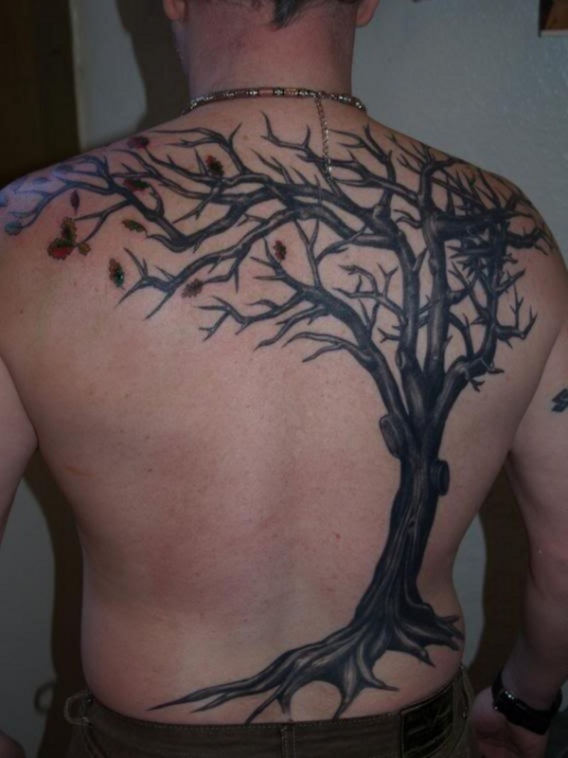 Great black tree tattoo on back