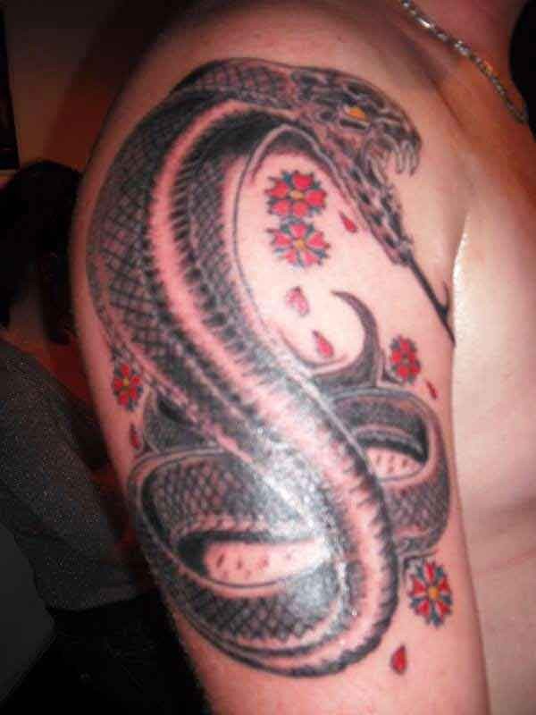 Great cobra shake with flowers  tattoo