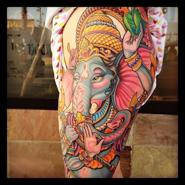 Great colorful indian ganesha on thigh