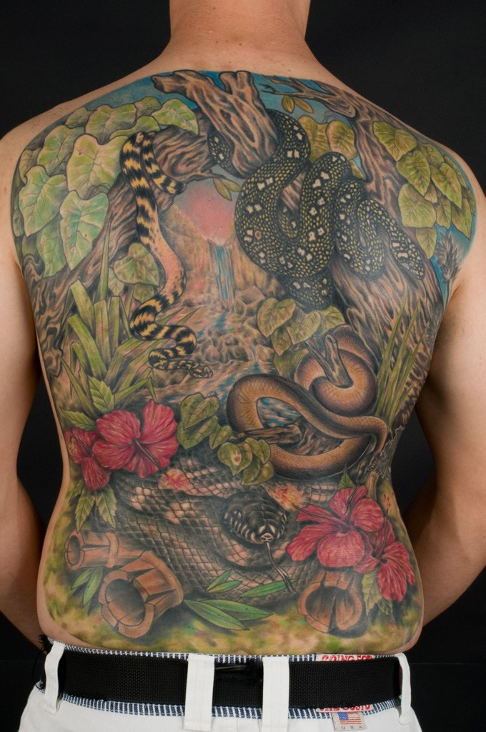 Colorful snakes in forest  tattoo on whole back