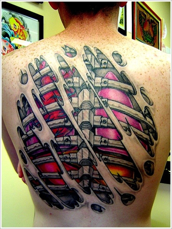 Great coloured armor and bones under skin rip tattoo on back