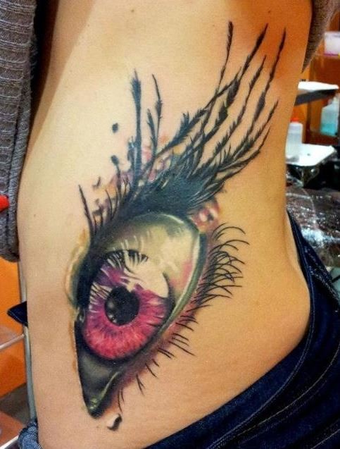 Great coloured eye tattoo on ribs
