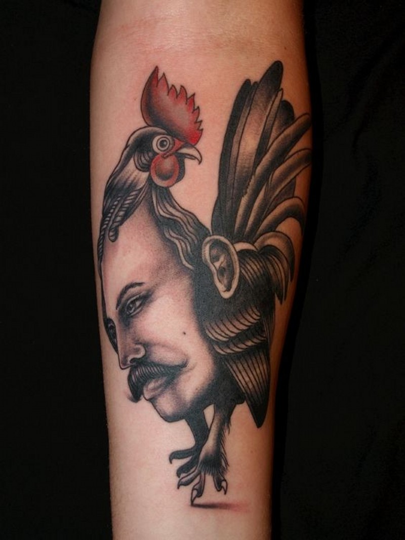 Great designed colored hen with portrait tattoo on arm