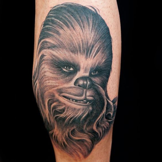 Great painted and detailed colored forearm tattoo of Chewbacca portrait