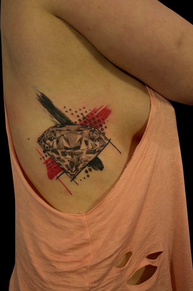 Great painted big colored tattoo with diamond on side