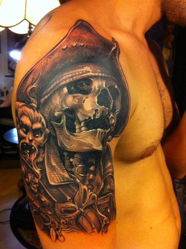 Great pirate skull tattoo on shoulder