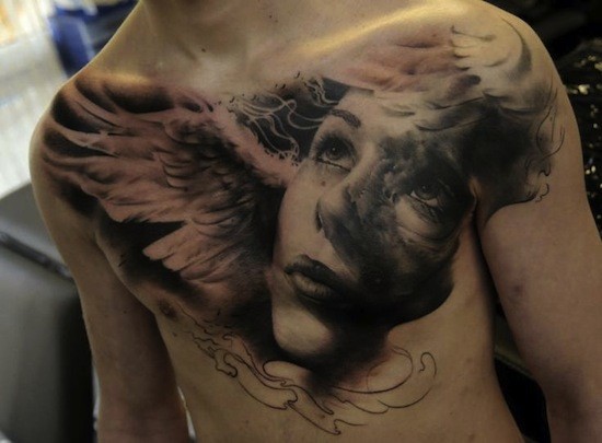 Great portrait of an angel tattoo on chest