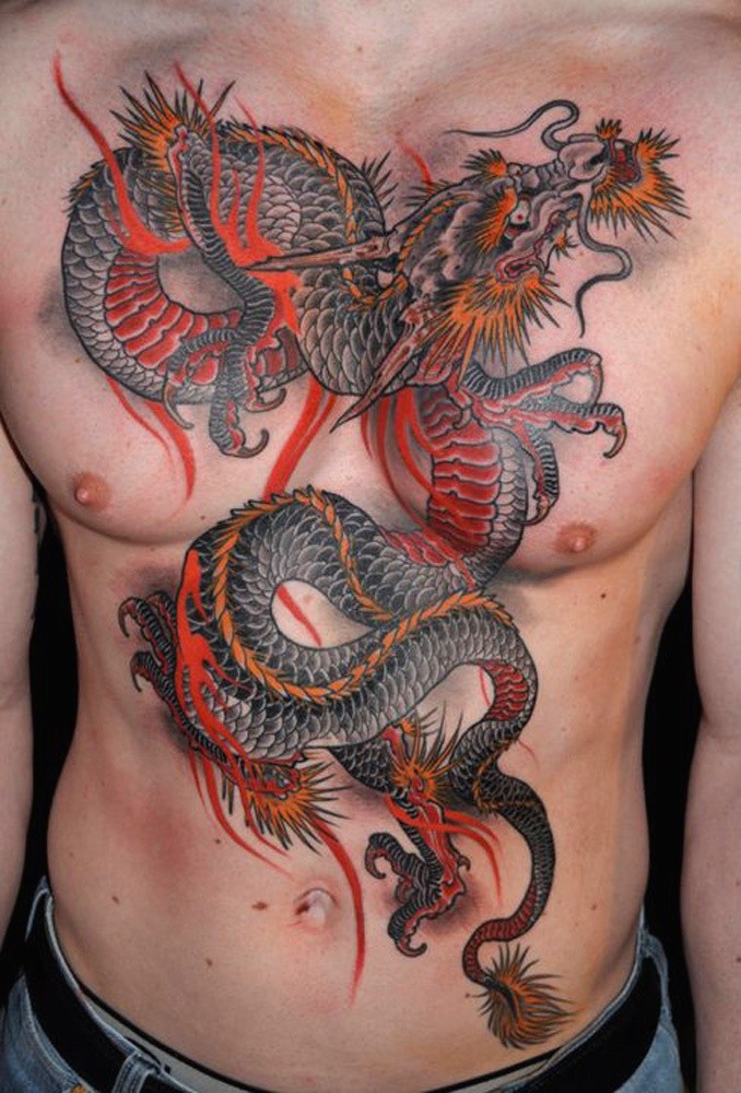 Great red dragon tattoo on chest and abdomen