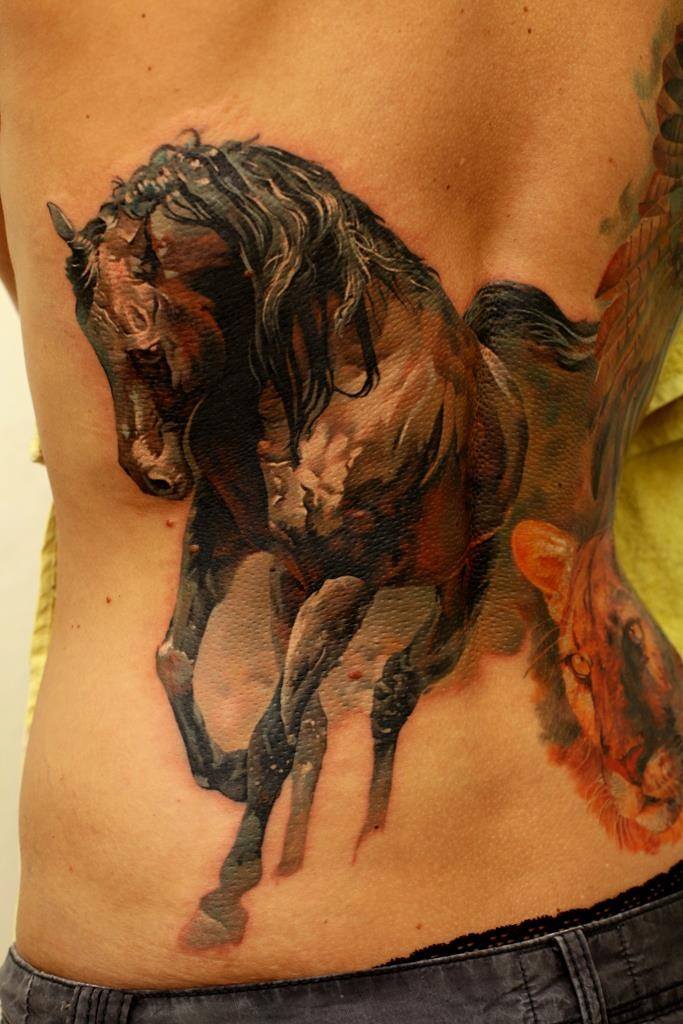 Great watercolor horse tattoo on back