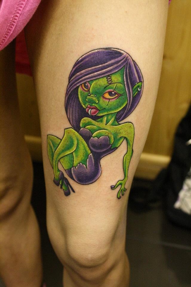 Green little girl zombi tattoo by Craig Holmes