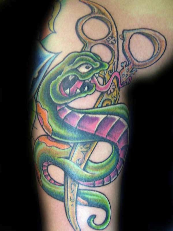Green snake and scissors tattoo