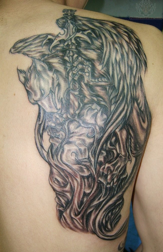 Griffin tattoo on back shoulder