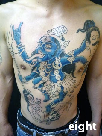 Half colored chest and belly tattoo of Hinduism God