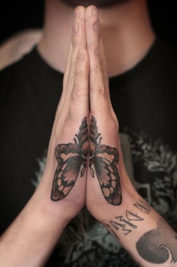 Half moth tattoo on both hands