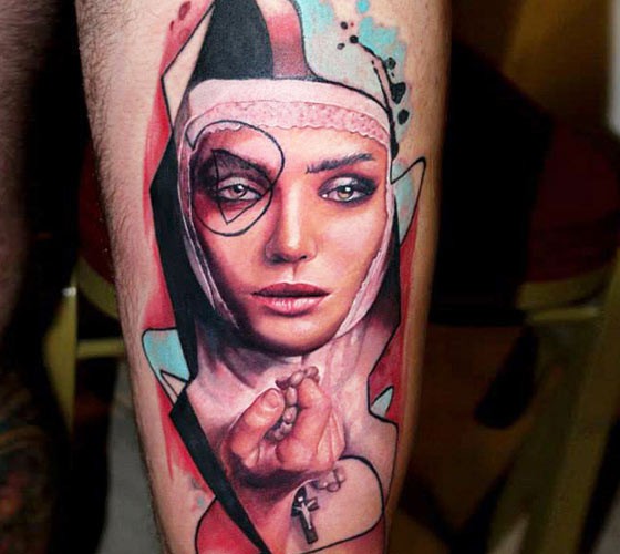 Half realism half abstract style tattoo of woman with cross
