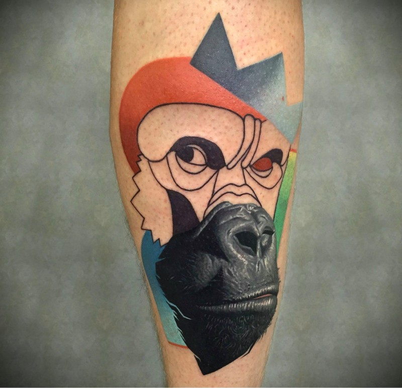 Half realistic half illustrative style colored forearm tattoo fo gorilla