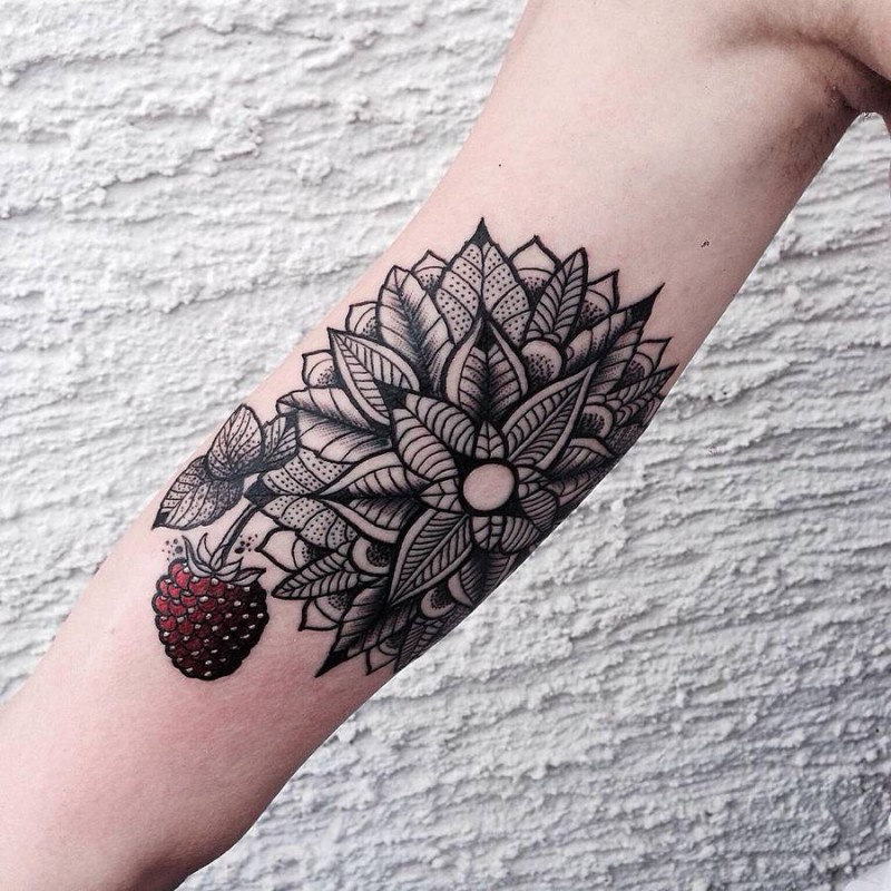 Hinduism style colored arm tattoo of ornamental flower with berry