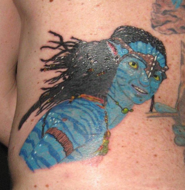 Homemade colored carelessly painted Avatar hero tattoo on back zone
