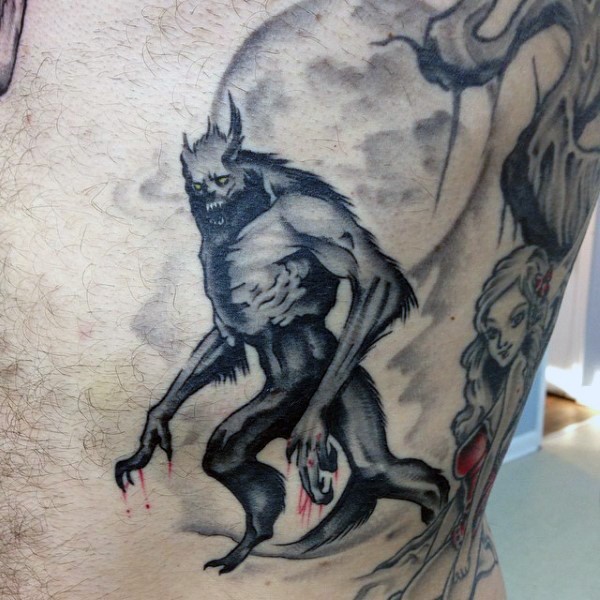 Homemade like colored back tattoo of bloody werewolf with woman