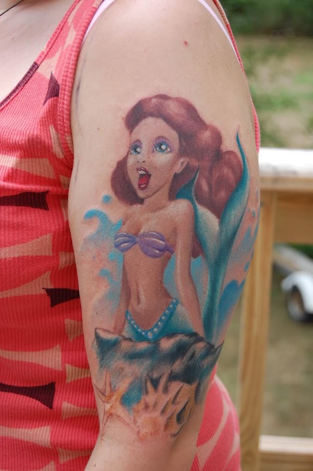 Homemade like colored beautiful mermaid tattoo on arm