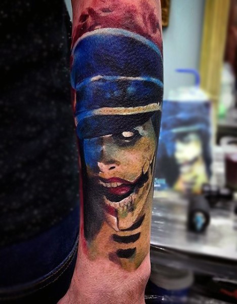 Homemade like colored forearm tattoo of monster zombie driver