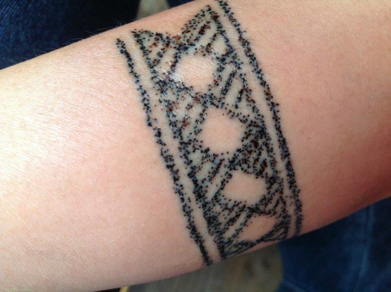 Homemade like dotwork style tattoo of simple ornament