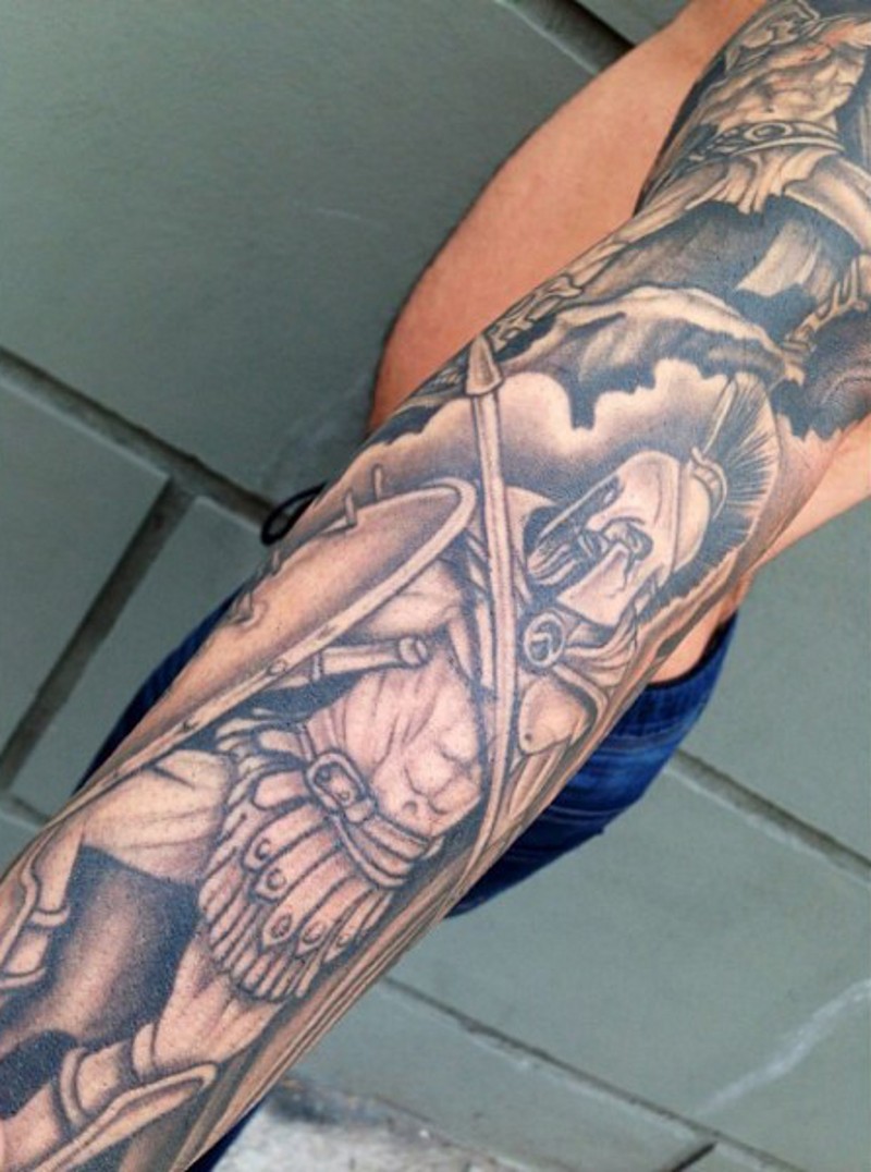 Homemade simple black and white sleeve tattoo of ancient Greece warriors