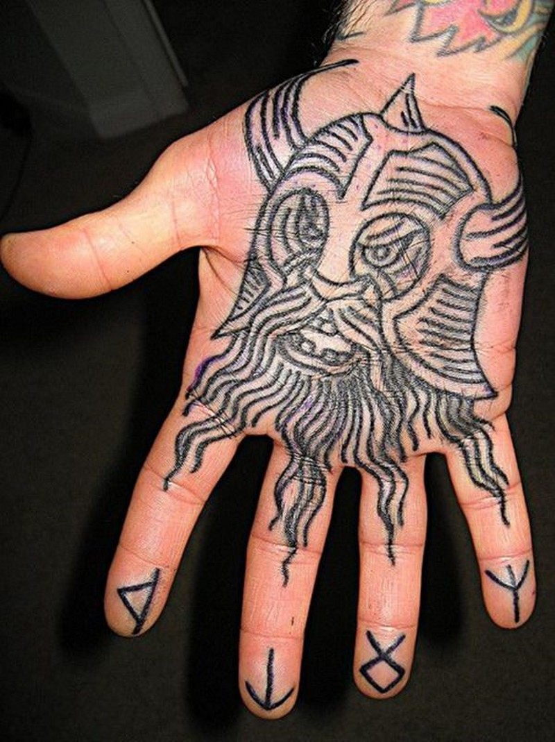 Homemade simple black ink carelessly painted hand tattoo of evil antic warrior