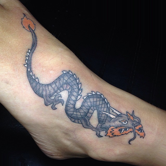 Homemade simple painted colored ankle tattoo of dragon