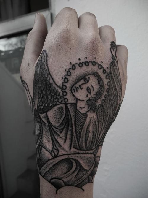 Homemade style black ink hand tattoo of angel picture