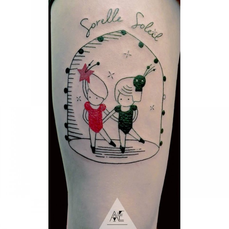 Homemade style colored arm tattoo of funny looking dancing dolls and lettering