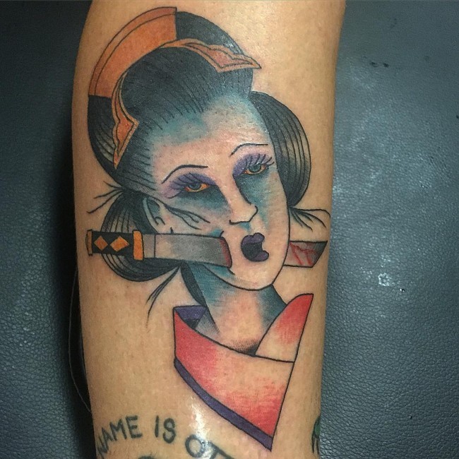 Homemade style colored dead geisha portrait tattoo with bloody knife