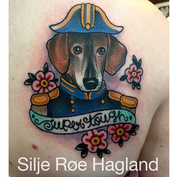 Homemade style colored scapular tattoo of military dog with lettering and flowers