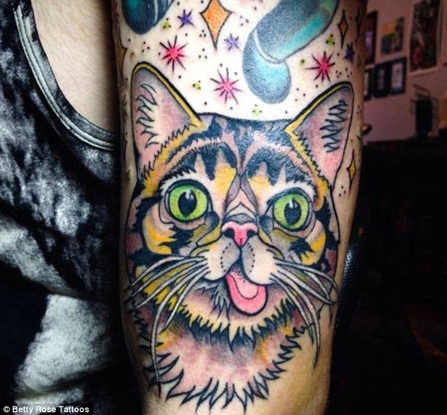 Homemade style colored shoulder tattoo of funny cat with stars
