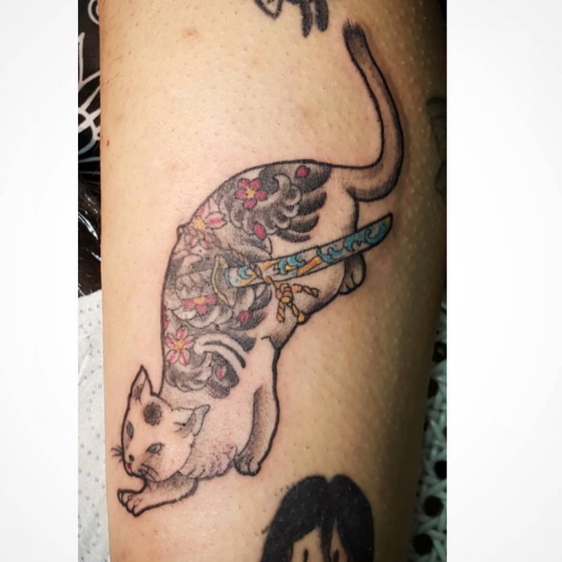 Homemade style colored tattoo of Japanese cat with sword