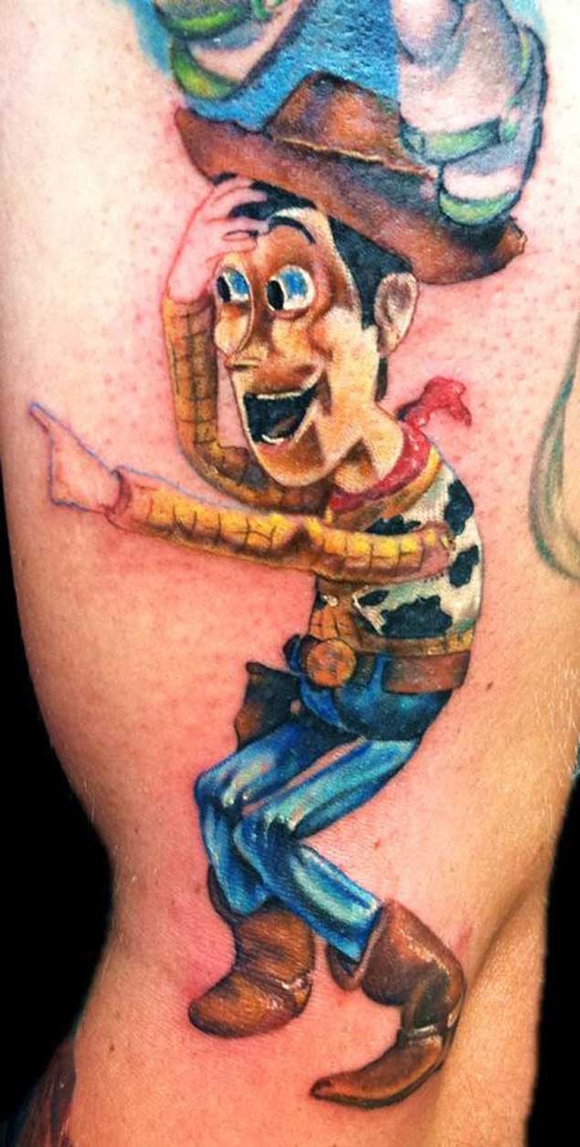 Homemade watercolor painted and colored Toy story cartoon cowboy hero tattoo on half sleeve