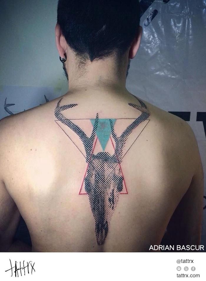 Horned deer skull dotted work back tattoo with colored geometrical style triangles by Adrian Bascur