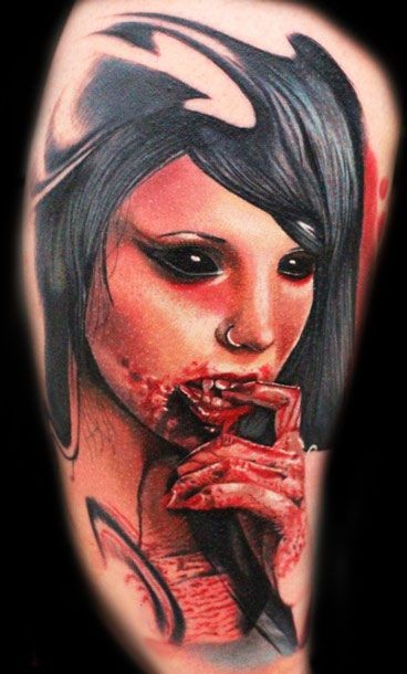 Horror movie like realistic colored bloody vampire woman tattoo on shoulder