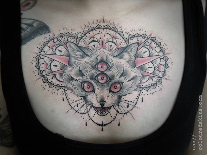 Horror style colored chest tattoo of demonic cat with floral ornaments