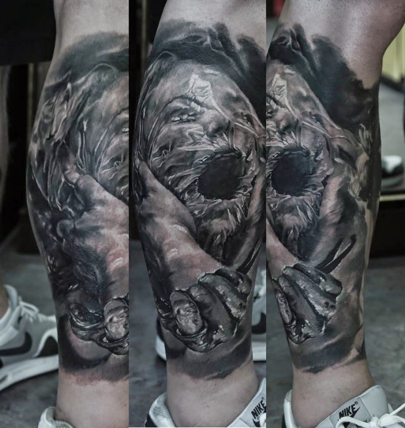 Horror style colored leg tattoo of screaming woman