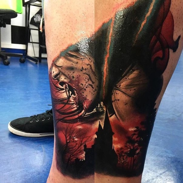 Horror style colored leg tattoo of bloody vampire woman with old house