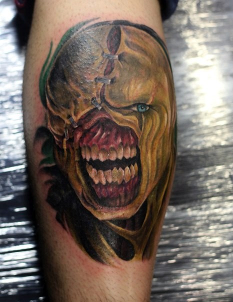 Horror style colored leg tattoo of monster from Resident Evil