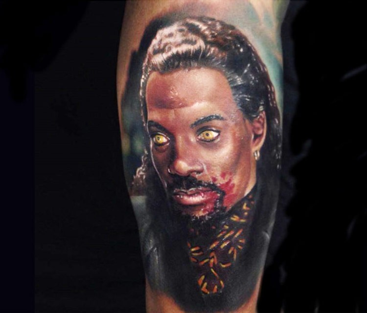 Horror style colored leg tattoo of vampire portrait