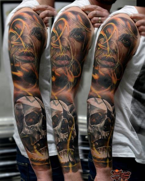 Horror style colored sleeve tattoo of mystical woman face and skull