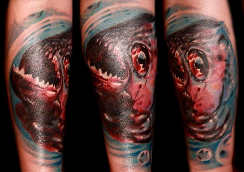 Horror style colored tattoo of bloody fish