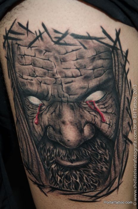 Horror style colored tattoo of evil men with beard