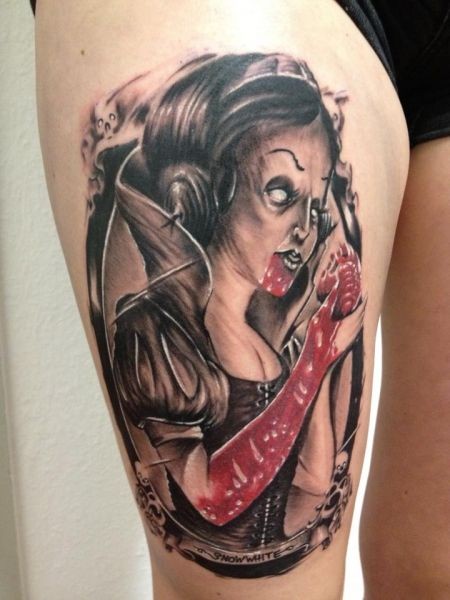 Horror style colored thigh tattoo of bloody woman with heart