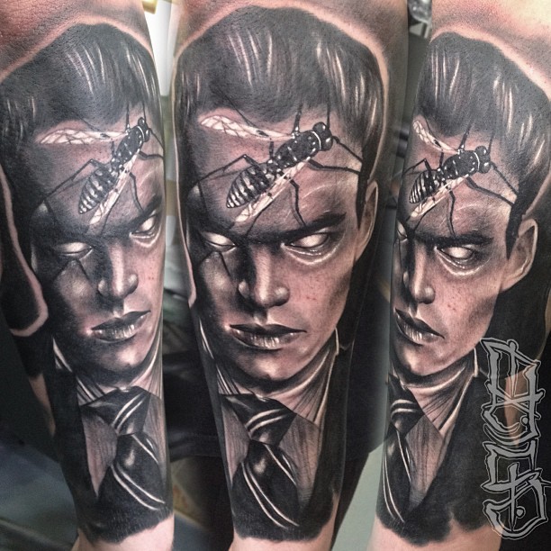 Horror style man's portrait with blind eyes and insect on face dark colored realistic tattoo
