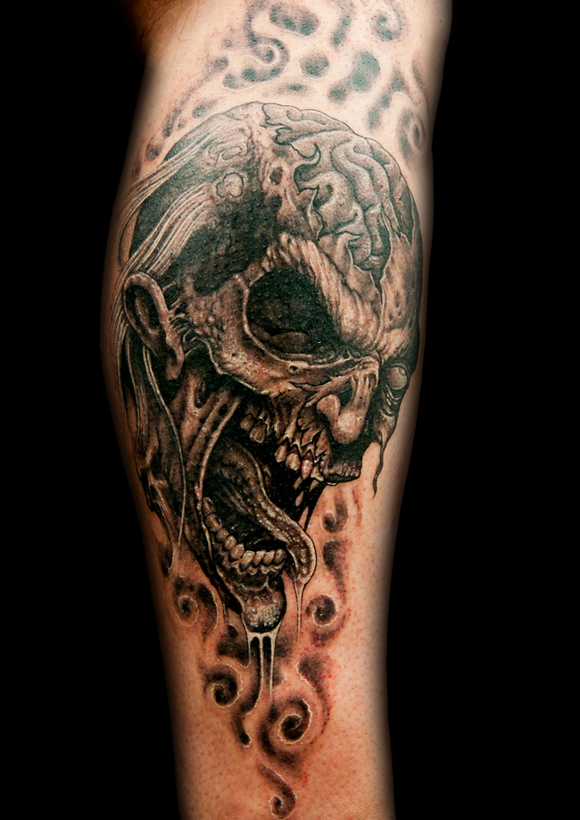 Horror video game like detailed black ink forearm tattoo of monster zombie face